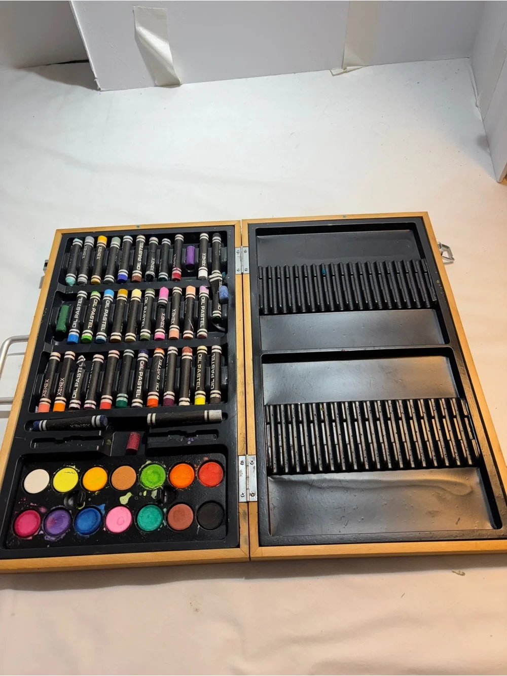 Wooden Portable Art Supply Storage Case with Multicolor Paints and oil pastels
